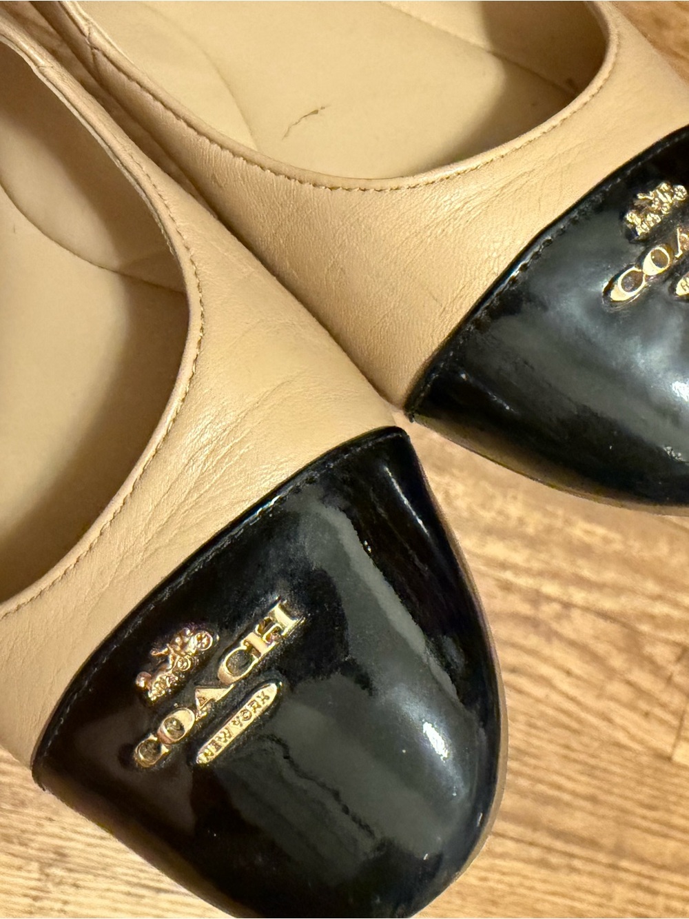 Coach Beige Leather Flats with Black Patent Cap Toes